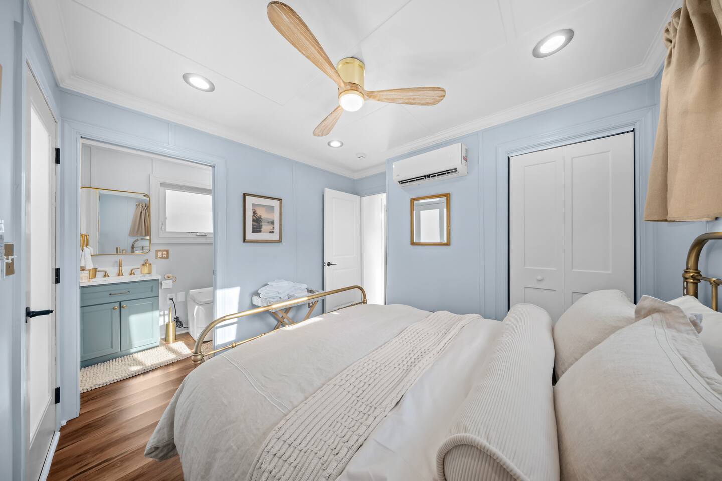 Bedroom with soft daylight and linen bedding