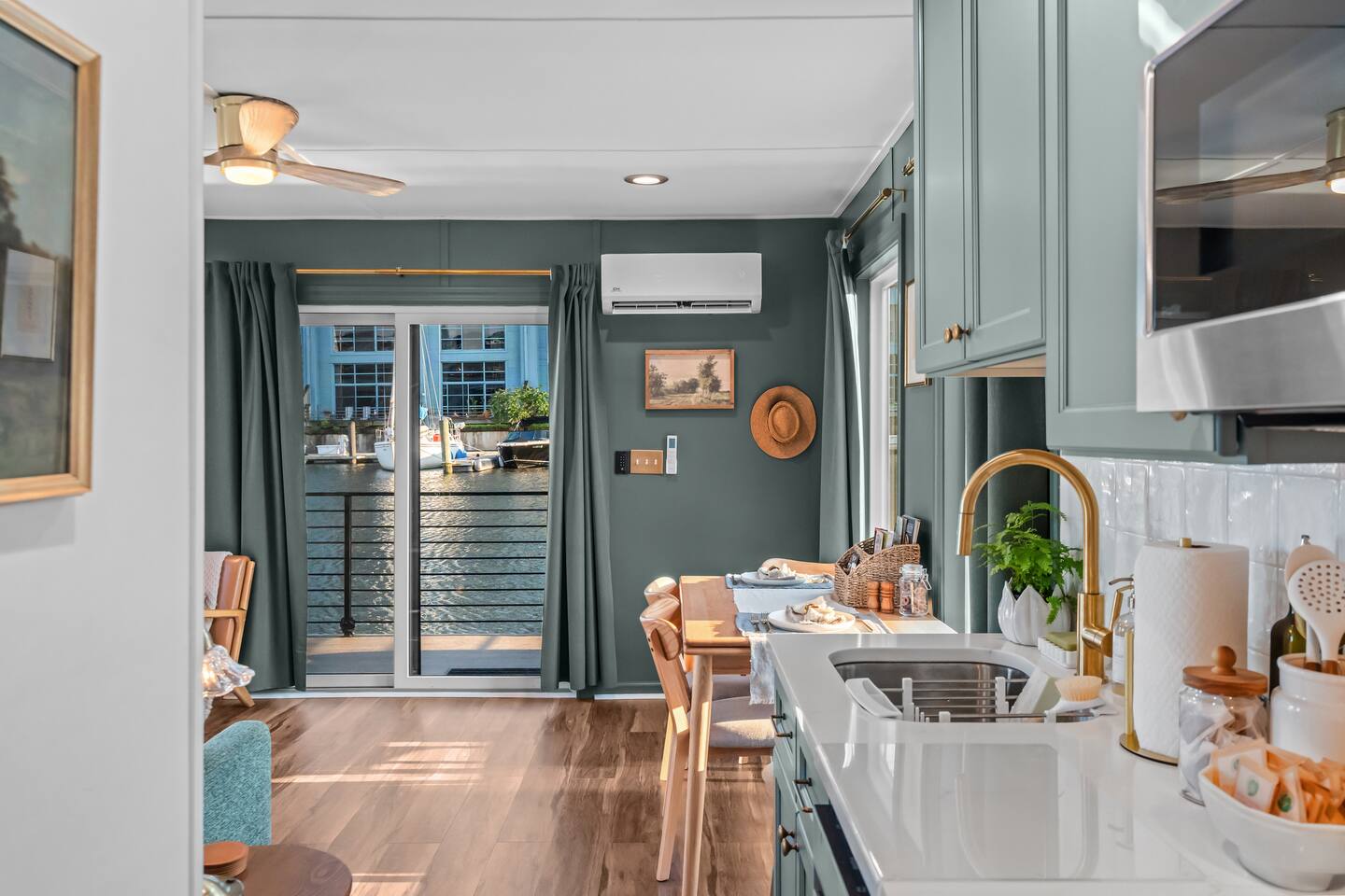 Kitchen with brass faucet and farmhouse sink