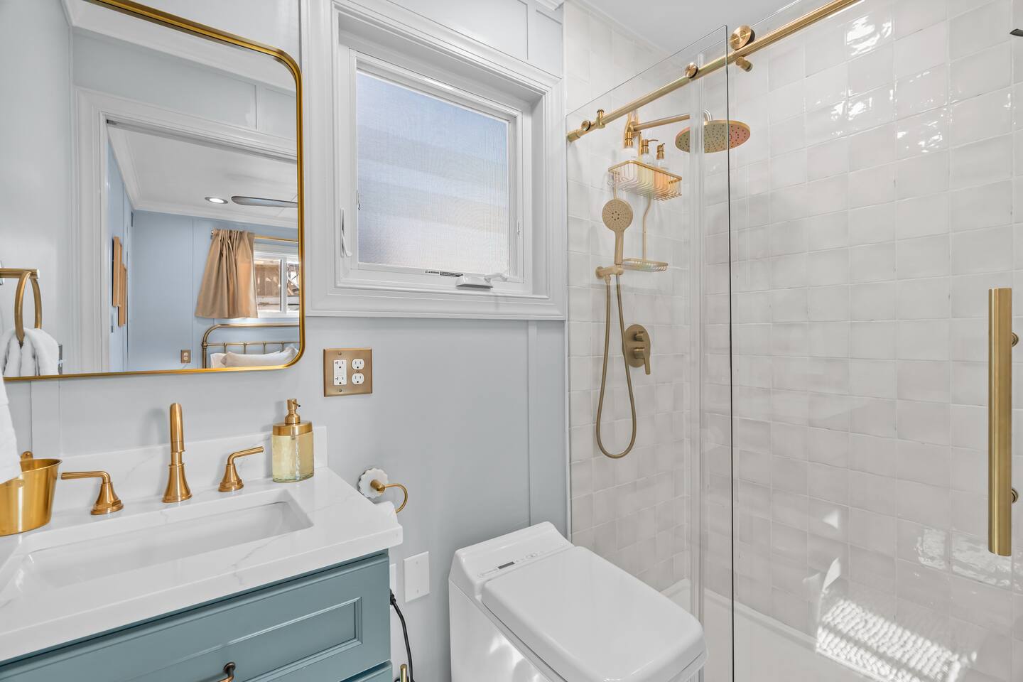 Walk-in shower with brass rainfall head