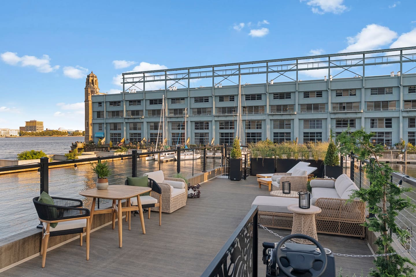 Rooftop lounge seating across Pier 5 Marina